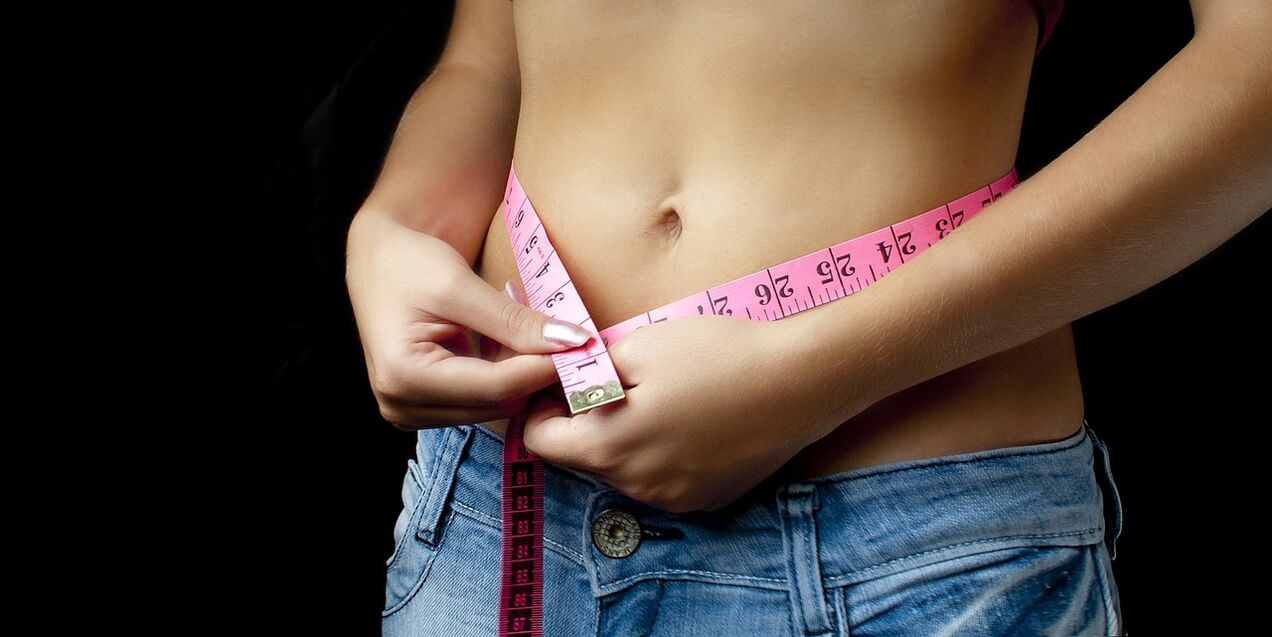 medição da cintura durante a perda de peso por um mês